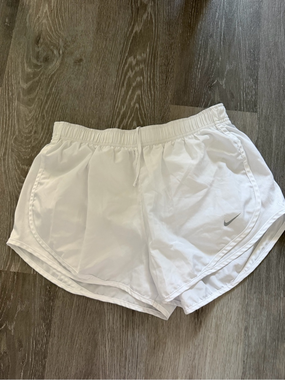 Nike Women's White Athletic Running Shorts with Silver Swoosh